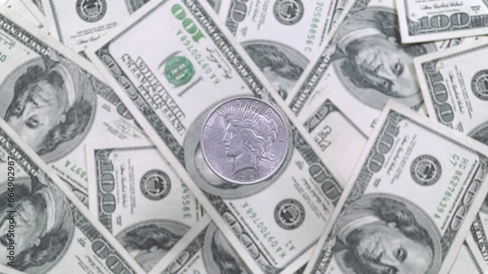 Five United States Dollars And Rotating One Hundred Dollar Bills. Five United States Dollars And Rotating One Hundred Dollar Bills.