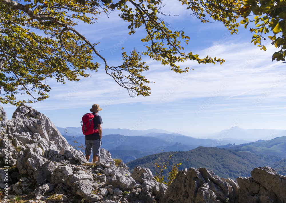 Obraz premium Man at the viewpoint of San Adri?n in the Aizkorri-Aratz Natural Park, Euskadi