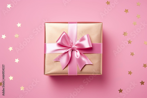 pink gift box with ribbon top view, Valentine's Day  © reddish