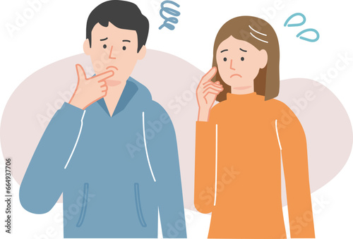 悩みながら首をかしげる若い夫婦