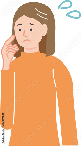 悩みながら首をかしげる若い女性