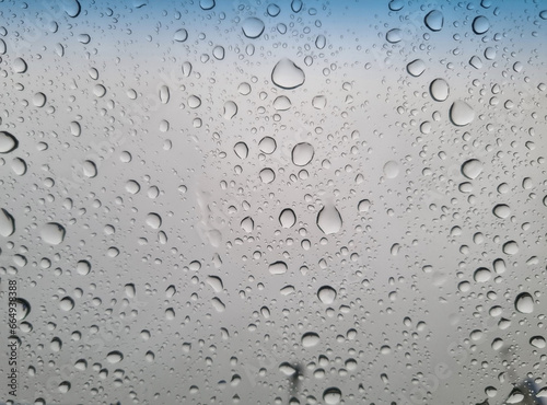 Raindrops on the car glass. Selective focus