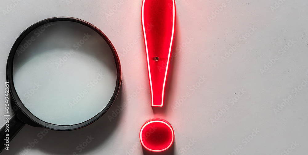 magnifying glass with red neon light exclamation mark isolated on white ...