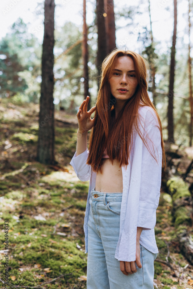 Beautiful woman natural face freckles casual female portrait lifestyle beauty girl. Outdoor girl portrait in green summer forest Beautiful woman natural face freckles casual female portrait lifestyle beauty girl. Outdoor girl portrait in green summer forest