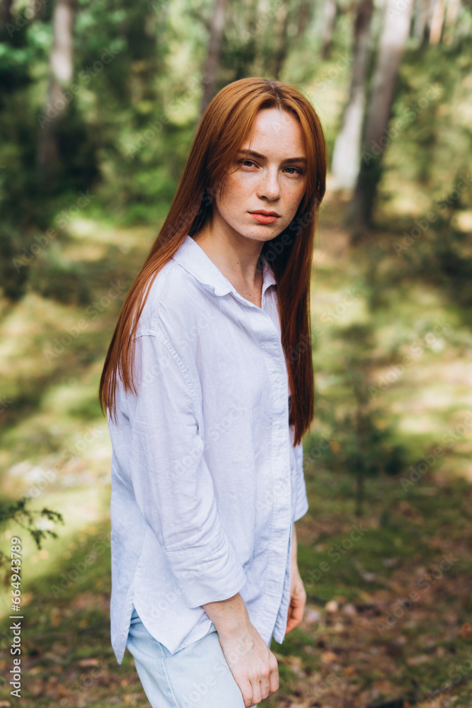 Beautiful woman natural face freckles casual female portrait lifestyle beauty girl. Outdoor girl portrait in green summer forest Beautiful woman natural face freckles casual female portrait lifestyle beauty girl. Outdoor girl portrait in green summer forest