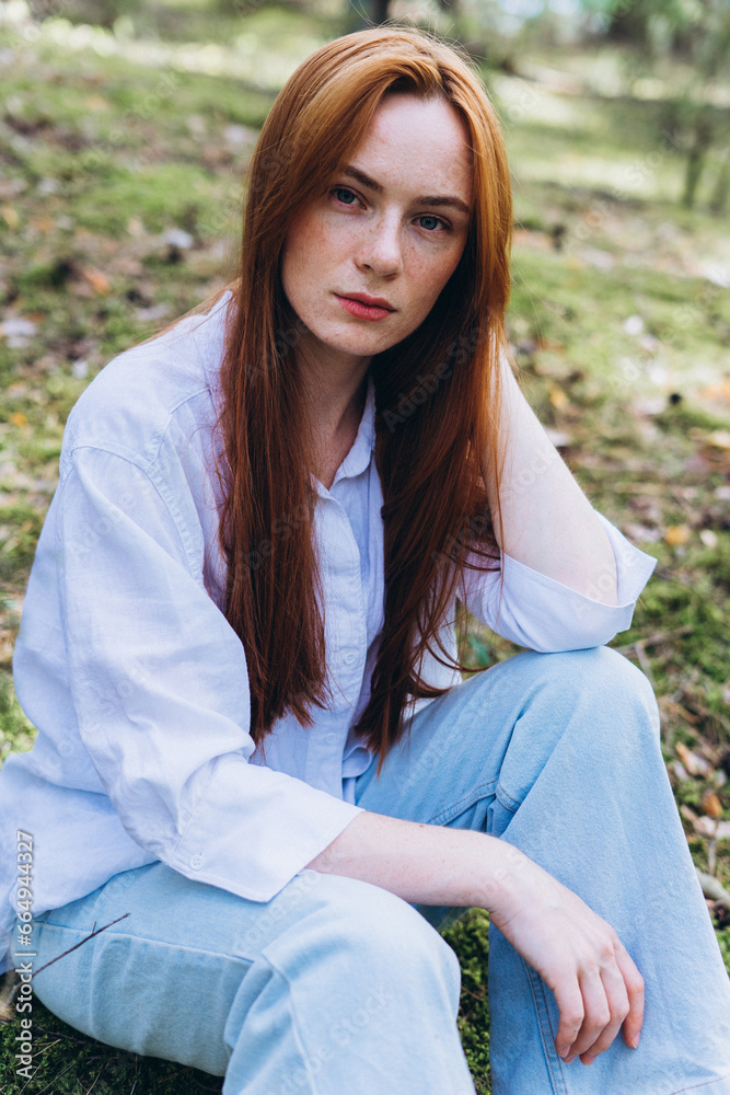 Beautiful woman natural face freckles casual female portrait lifestyle beauty girl. Outdoor girl portrait in green summer forest Beautiful woman natural face freckles casual female portrait lifestyle beauty girl. Outdoor girl portrait in green summer forest
