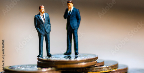 piazza navona city miniature businessmen stand resolutely on a pile of coins symbolizing fis 