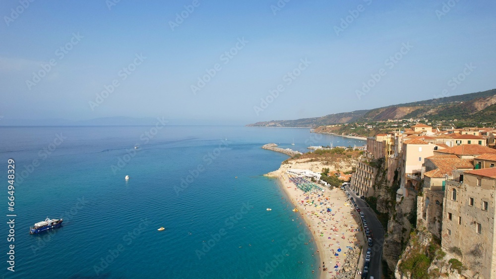 Tropea - Italy - Aerial view of the coast of Tropea in the summer season to the beach between the old town and the castle, Calabria