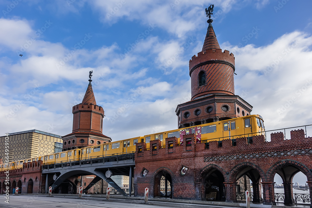 The fragment of Oberbaum Bridge (Oberbaumbrucke, brick bridge from 1896) over the Spree River. Berlin, Germany. The fragment of Oberbaum Bridge (Oberbaumbrucke, brick bridge from 1896) over the Spree River. Berlin, Germany.