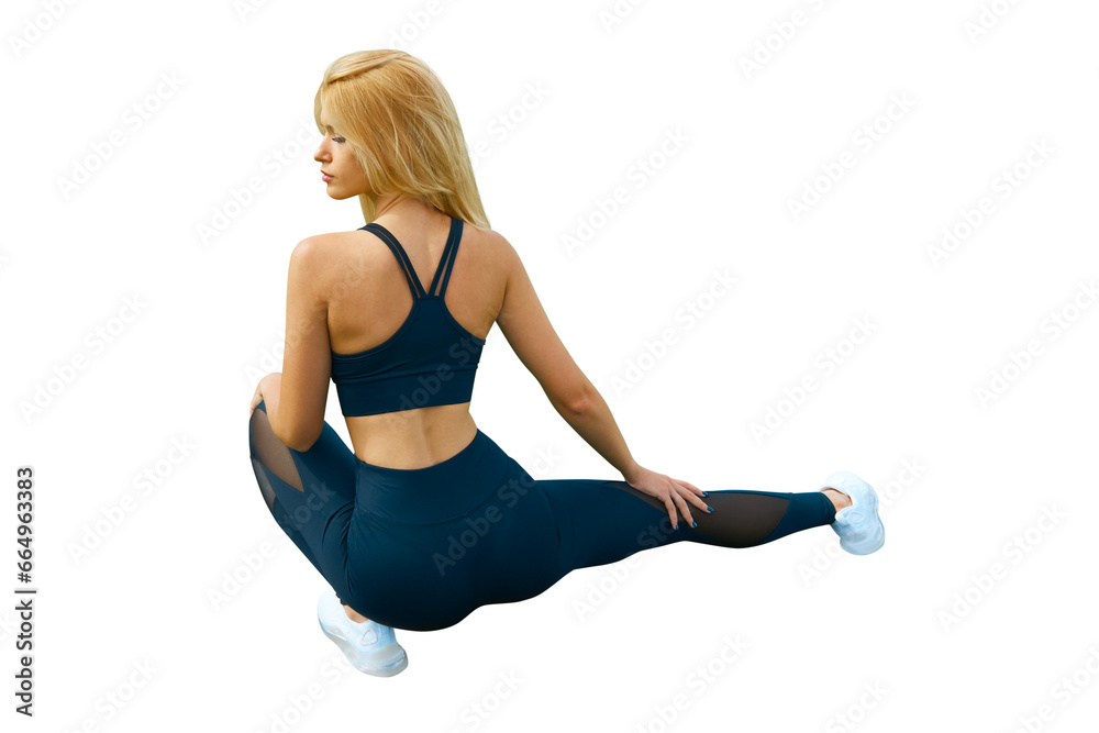 Fototapeta premium Fit woman in sitting on the floor isolated on white. Slim attractive female with flat belly relaxed or stretching