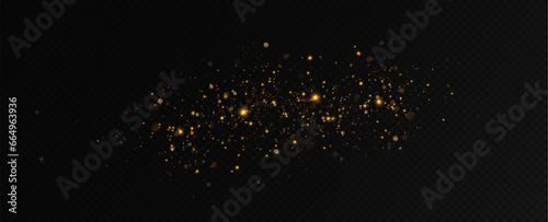 Golden sequins glow with many lights. Glittering dust. Luxurious background of golden particles.	