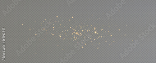 Golden sequins glow with many lights. Glittering dust. Luxurious background of golden particles.	