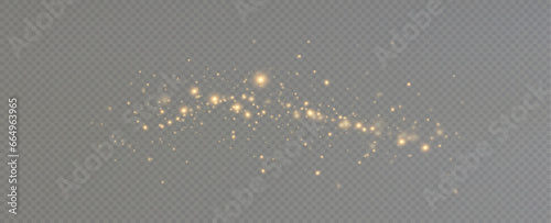 Golden sequins glow with many lights. Glittering dust. Luxurious background of golden particles.	