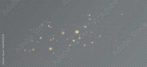 Golden sequins glow with many lights. Glittering dust. Luxurious background of golden particles.	