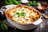 a casserole dish with baked pasta and cheese