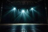 dramatic shot of a lone spotlight illuminating a theater stage