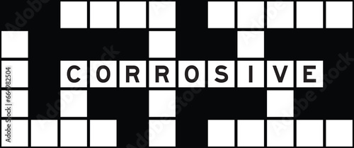 Alphabet letter in word corrosive on crossword puzzle background