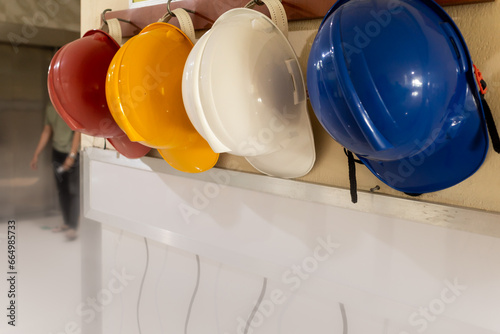 Safety helmets differentiated by color at hospital