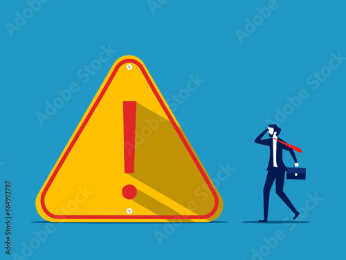 Warning and decision making. Businessman makes decision on exclamation mark sign. Vector