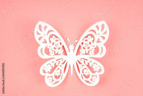 Hand made butterfly Paper Cut on pink color © gamjai