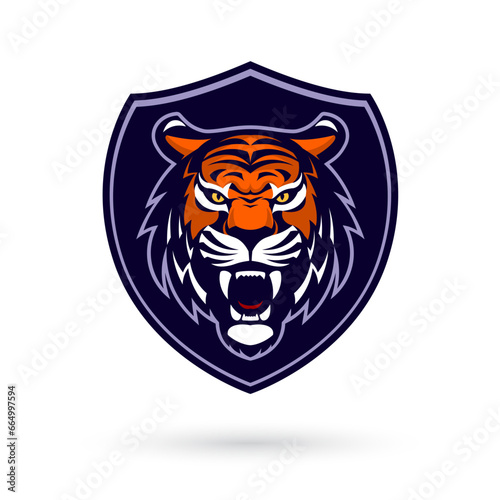 A fierce and powerful tiger mascot head logo, perfect for esport and gaming teams. The design features a tiger in a shield, representing strength and competitiveness