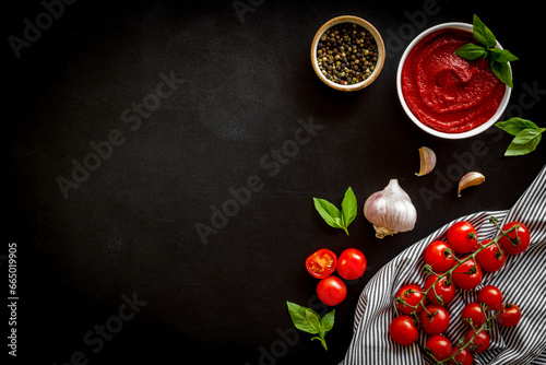 Italian tomato sauce for pasta - passata with tomatoes and basil