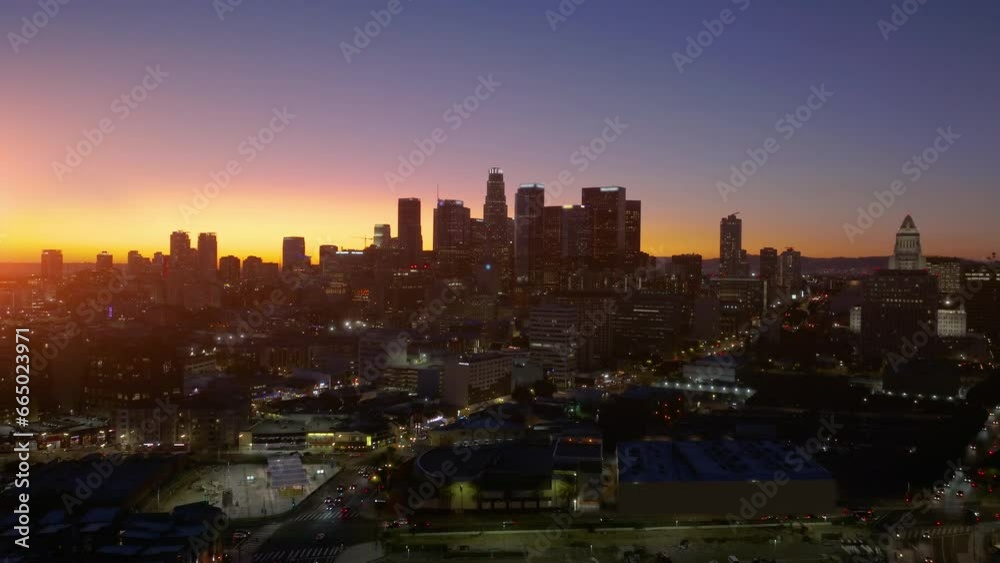 Aerial of downtown Los Angeles in dawn, sunset in California, skyscrapers and office buildings. Aerial of downtown Los Angeles in dawn, sunset in California, skyscrapers and office buildings.