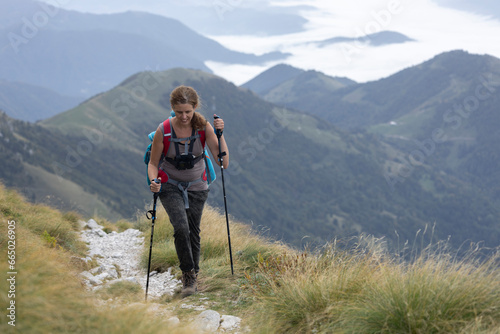 Woman Hiking from the valley to the top of mount Krn - Julian Alps Slovenia 