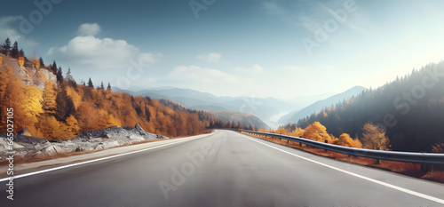 road in autumn fall with mountains landscape