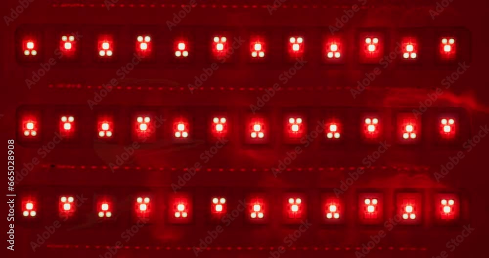 Macro shot of multicolored RGB diode blinking lights. LED colored dots