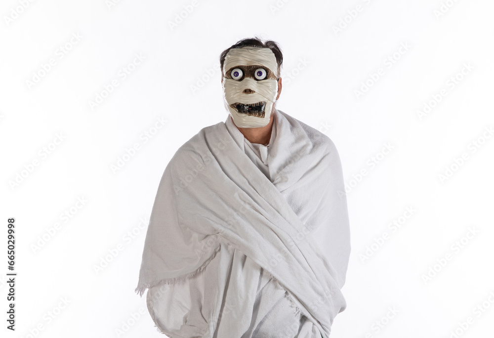 © serikbaib - funny man in a mummy costume © serikbaib - funny man in a mummy costume