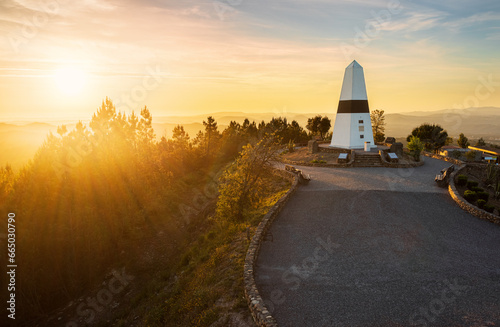 Geodesic center of Portugal in Vila de Rei, with a beautiful sunset in the background.