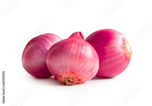 Fresh red onion bulbs in stack isolated on white background with clipping path