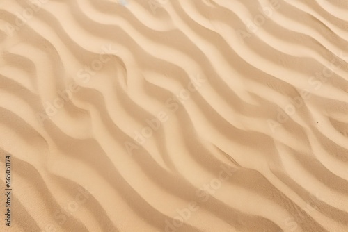 Closeup of sand pattern of a beach in the summer. photo