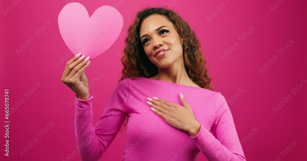 Beautiful young woman in love, hugging heart self love, pink studio Valentines Beautiful young woman in love, hugging heart self love, pink studio Valentines