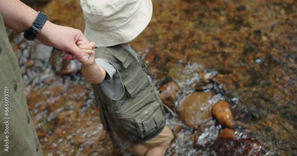 happy family mother holding hand cute little Asian toddler daughter walking in mountain river water creek Learning about Nature in the rainforest, adventure explorer camping travel trip happy family mother holding hand cute little Asian toddler daughter walking in mountain river water creek Learning about Nature in the rainforest, adventure explorer camping travel trip