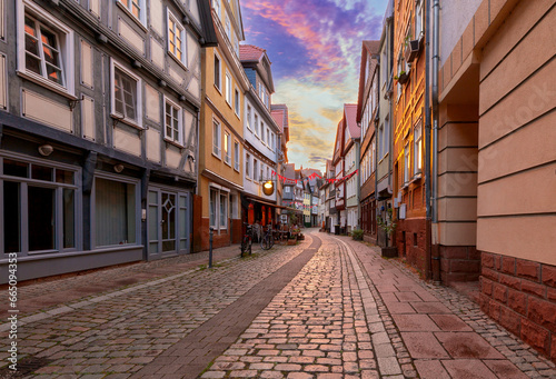 Fototapeta Naklejka Na Ścianę i Meble -  Marburg. Old medieval street in the historical center at sunset.