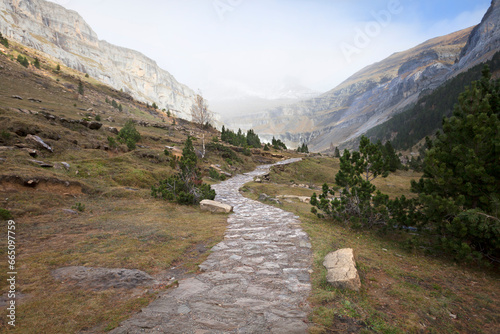 Hiking landscape with trail to mountain