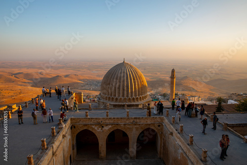 Tableau sur toile Roof of the Zinciriye Medresesi or Sultan Isa Madrasa at twilight in Mardin,