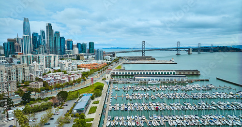 Photography Aerial South Beach Harbor with Oakland Bay Bridge leading to downtown skyscraper