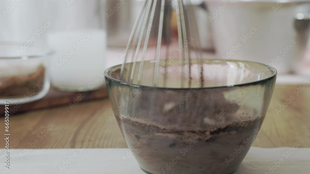 Preparing chocolate dessert using whisk Preparing chocolate dessert using whisk