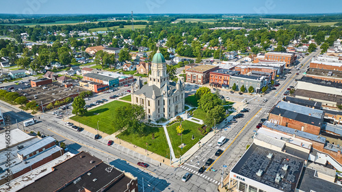 Bright summertime aerial Columbia City downtown courthouse with busy street © Nicholas J. Klein