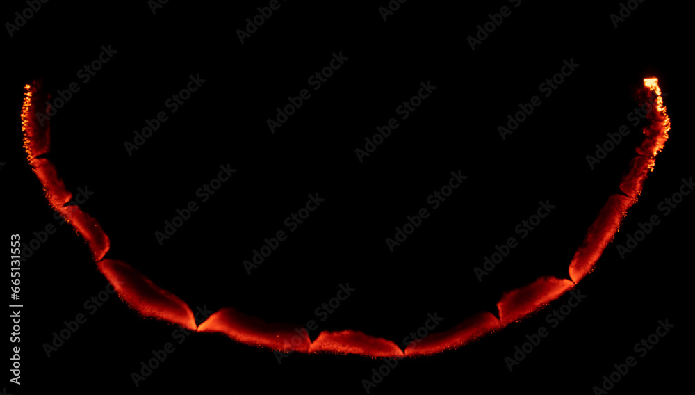 burning paper, glowing edge of paper on a black background burning paper, glowing edge of paper on a black background