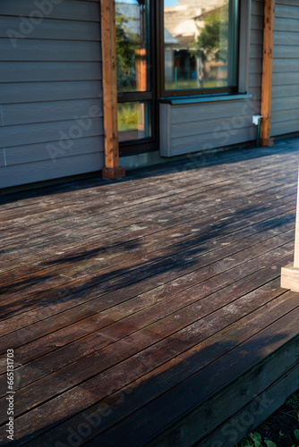 Konstfotografi Wet terrace wood planks boards with narrow DOF