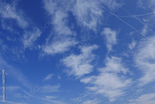 chemtrails in the blue sky  above italian coast