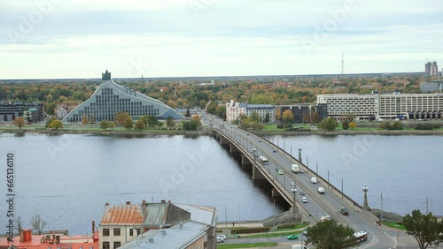 Akmens Bridge over Daugava River and National Library of Latvia in Riga in autumn photo