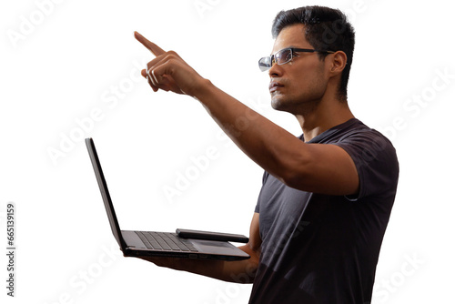 Young Latino with glasses and laptop, directing with hands, networking concept, programming, cyber security. Isolated.