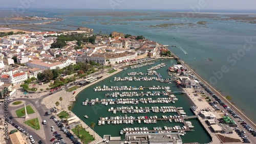 Aerial drone video of the harbor for boats in the marina of the city of Faro. Portugal Algarve.