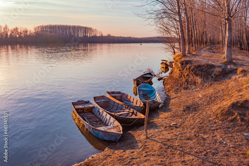 fishing boat on the river bank
