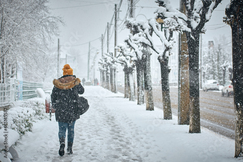 landscape with people in the streets in winter 1